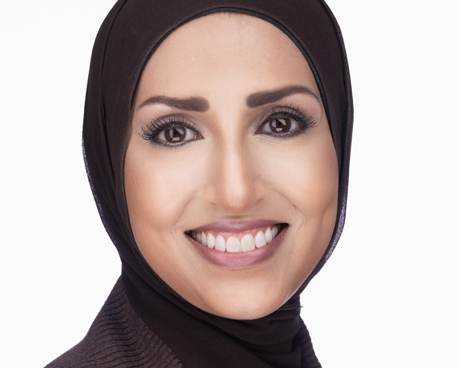 Professional headshot photographed in downtown Durham North Carolina studio for business branding.