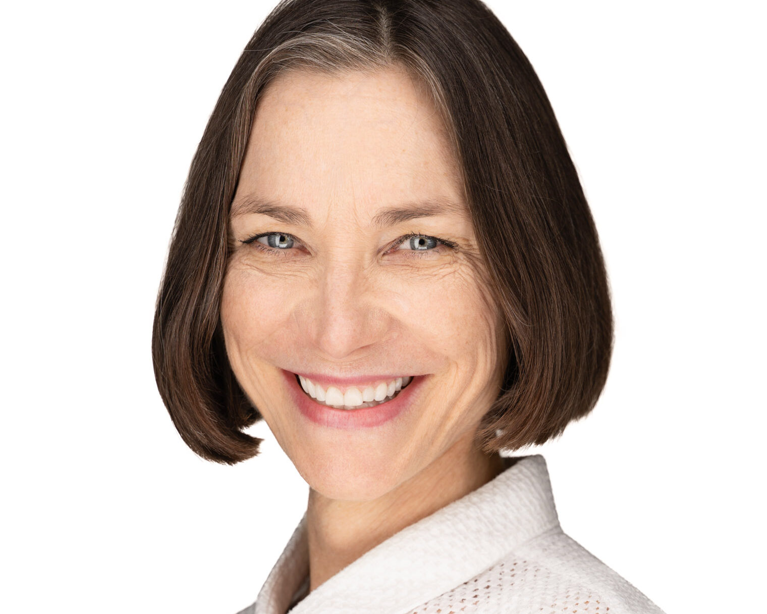 Professional business headshot photographed in Durham NC studio with clean white background.